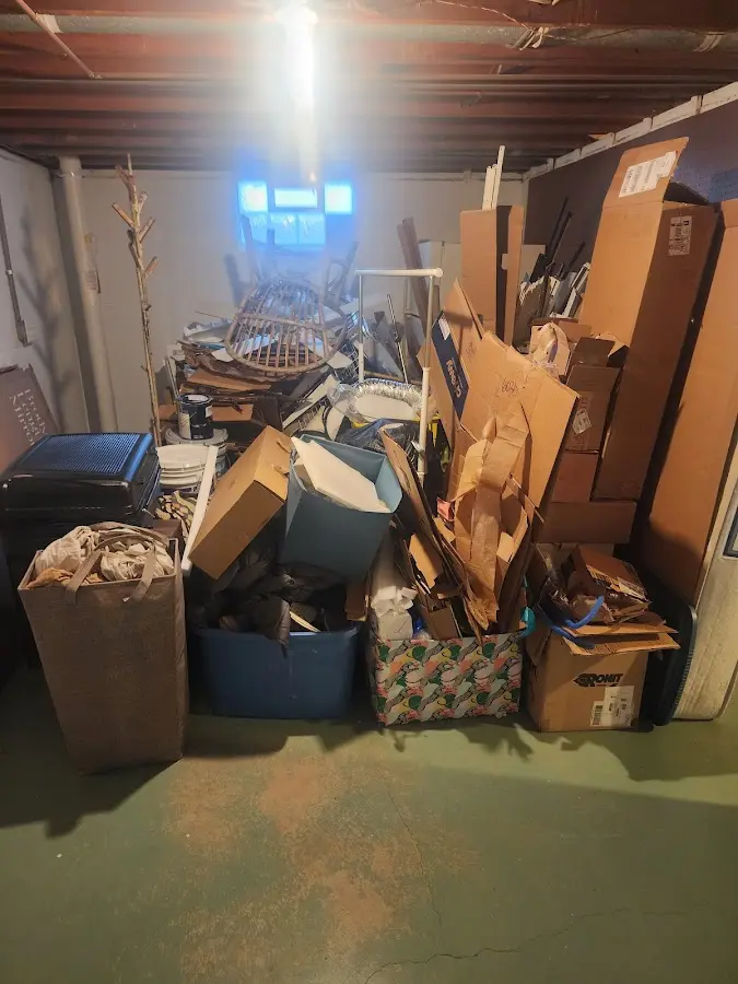 Roll-off dumpster container at job site for Yard Waste Dumpster Rental in Foley